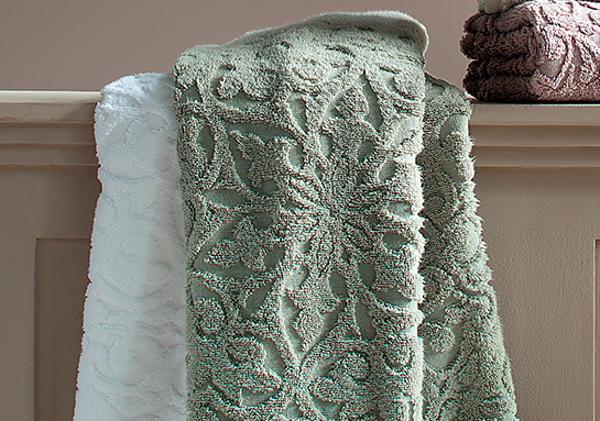 A suavidade aveludada e o toque superior tornam essas toalhas não apenas funcionais, mas também luxuosas.